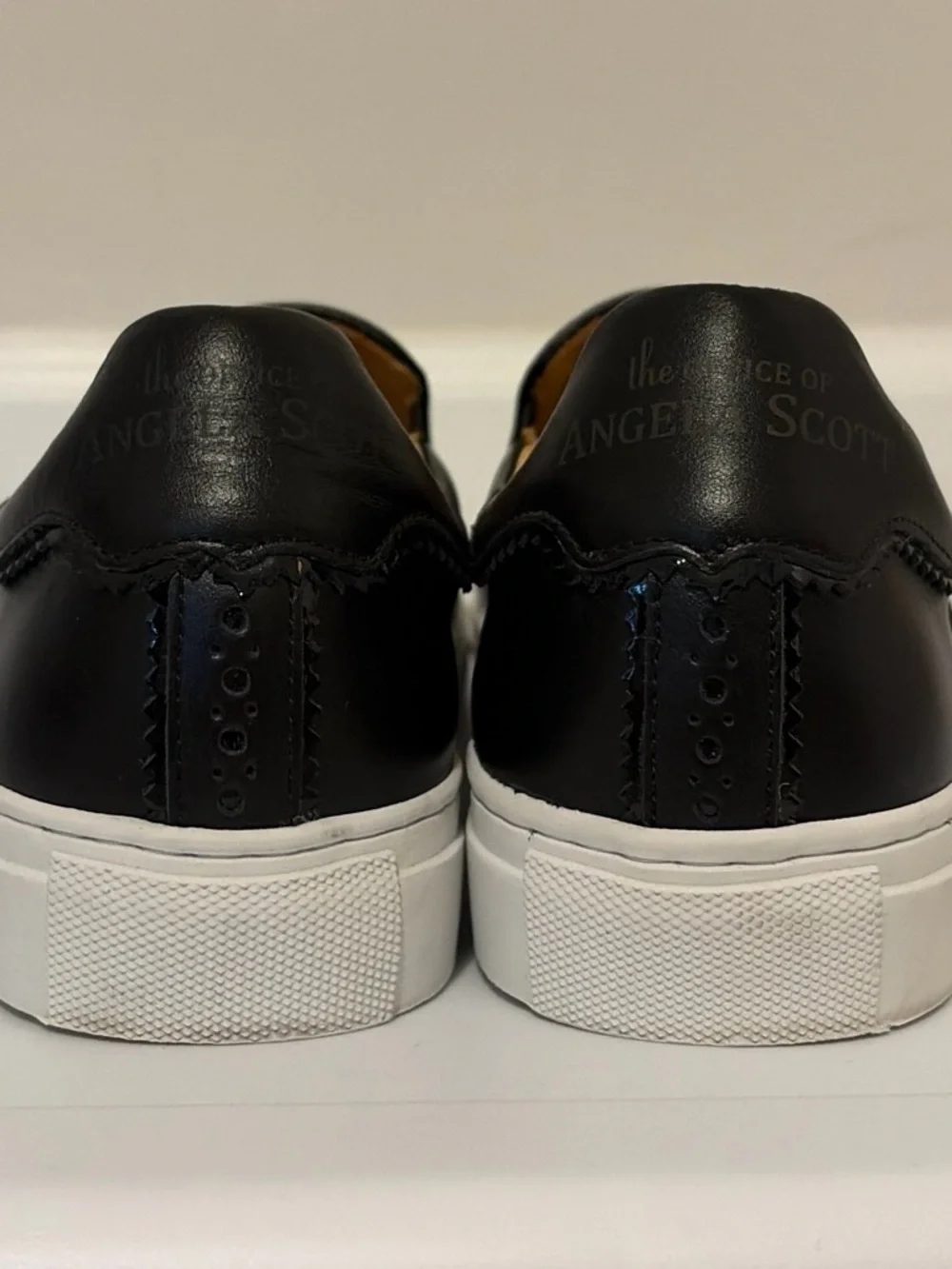Black and White Slip-On Wingtip Sneakers for Women
